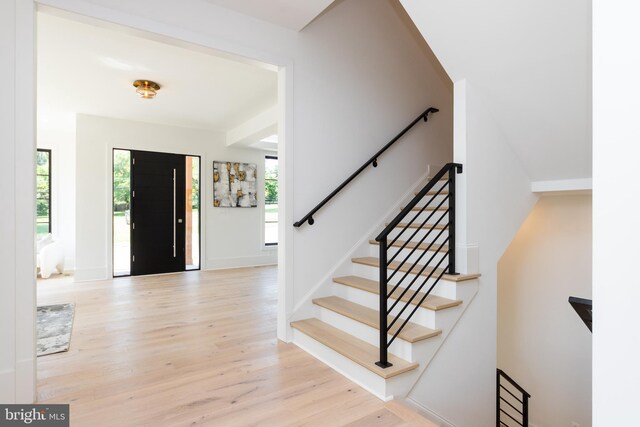 entrance foyer with light hardwood / wood-style flooring