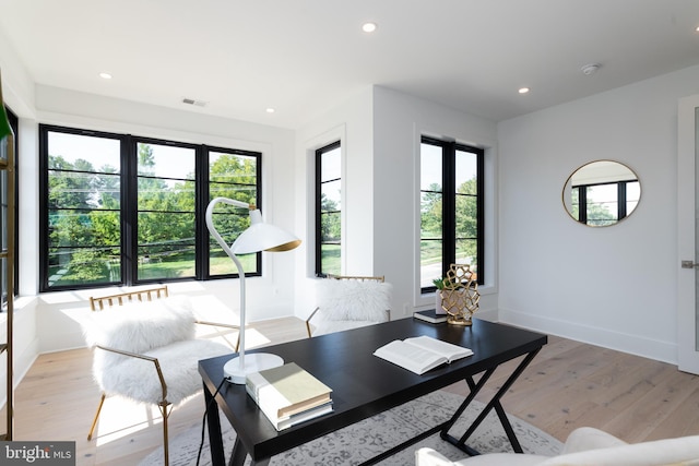 office space featuring light hardwood / wood-style floors