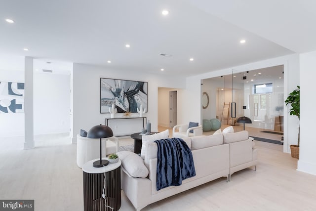 living room featuring light wood-type flooring