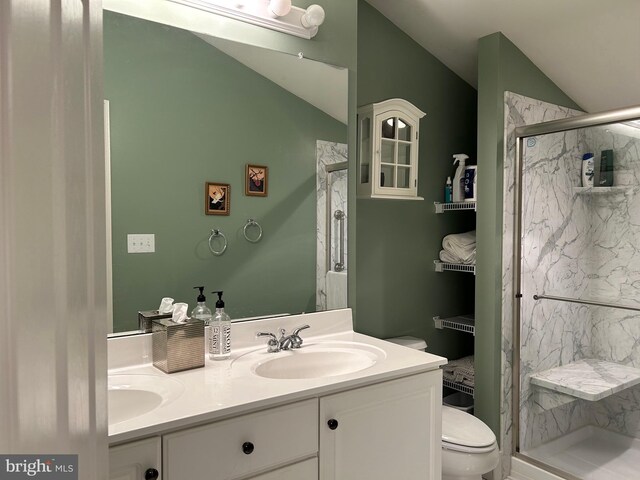 bathroom featuring a sink and double vanity