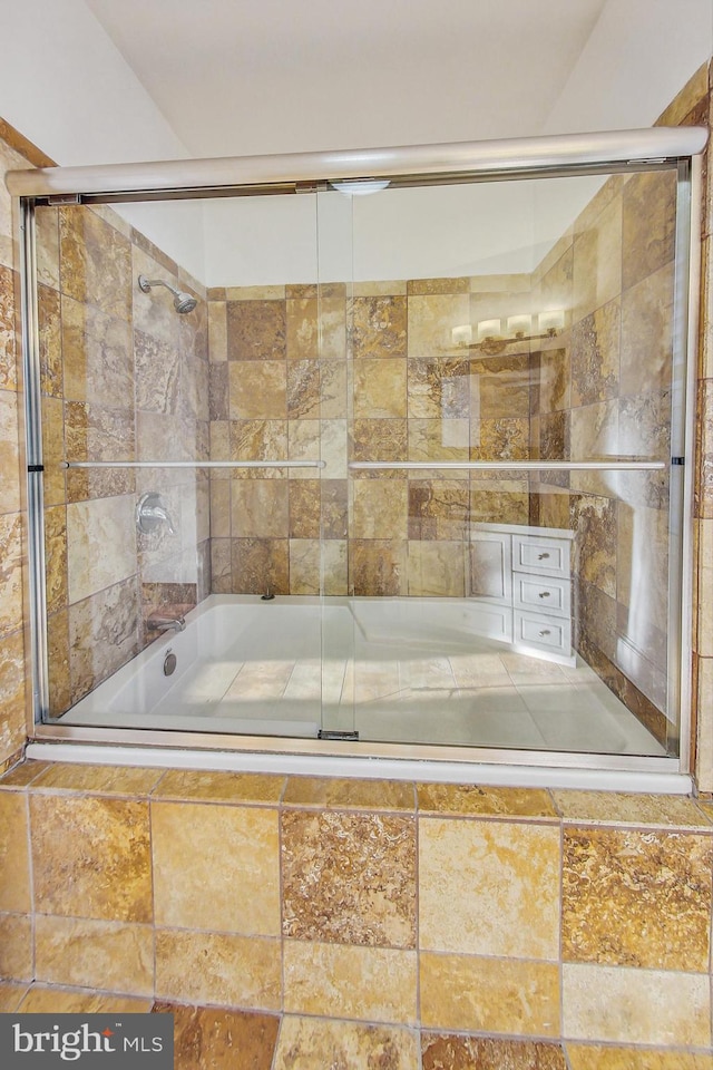 bathroom with shower with separate bathtub