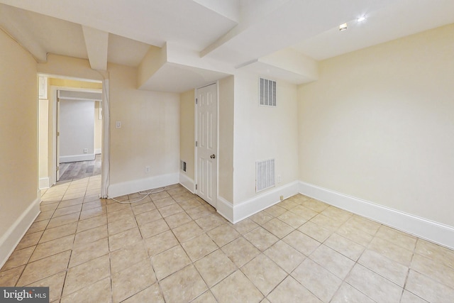 interior space featuring light tile patterned floors