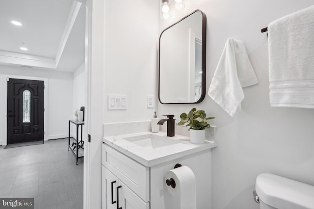 bathroom with vanity and toilet