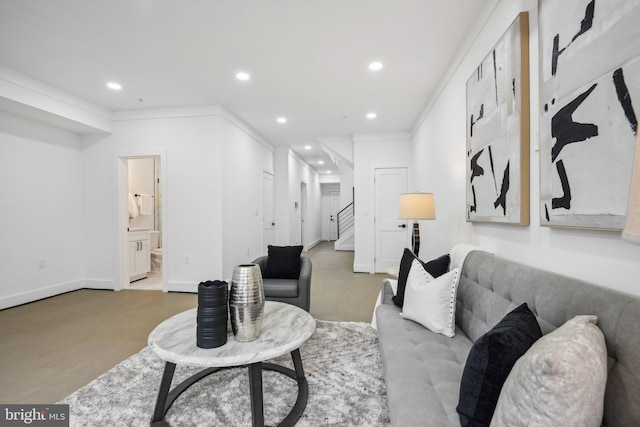 living room featuring crown molding