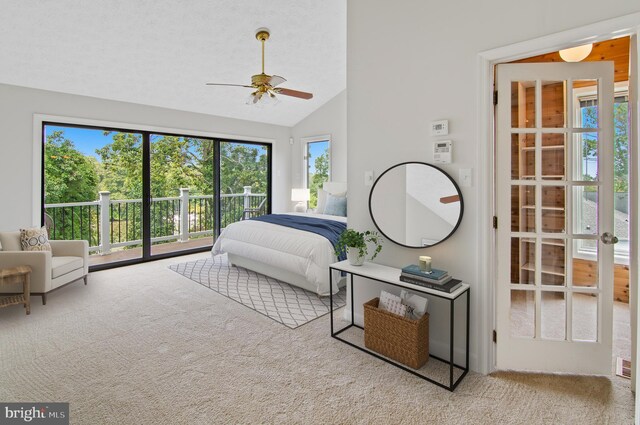 carpeted bedroom with lofted ceiling, ceiling fan, and access to exterior