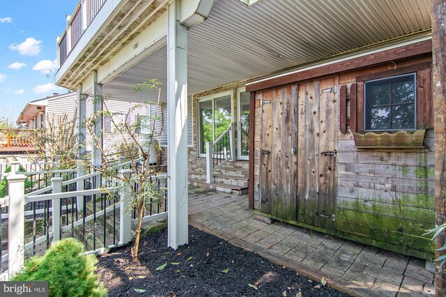 entrance to property with a porch