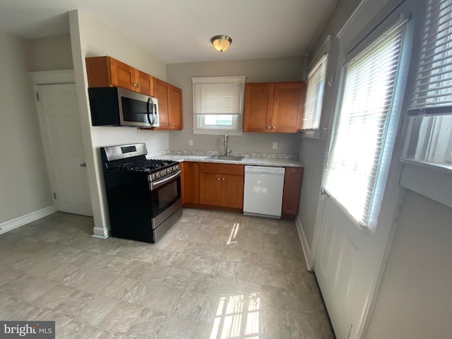 kitchen featuring appliances with stainless steel finishes and sink