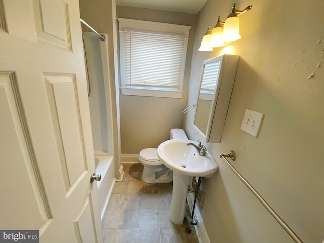 bathroom featuring toilet, shower / bathtub combination, and tile patterned floors