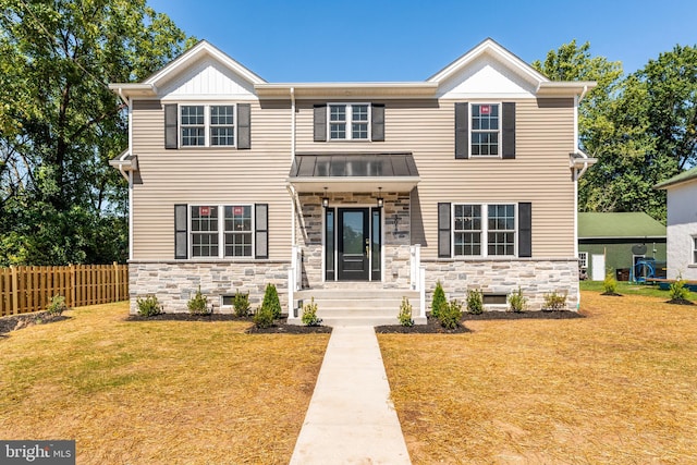 view of front facade with a front lawn