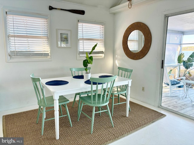 dining room featuring concrete floors