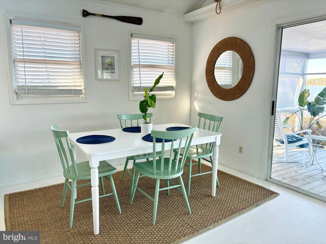 kitchen with white appliances, light hardwood / wood-style flooring, wood counters, sink, and decorative backsplash