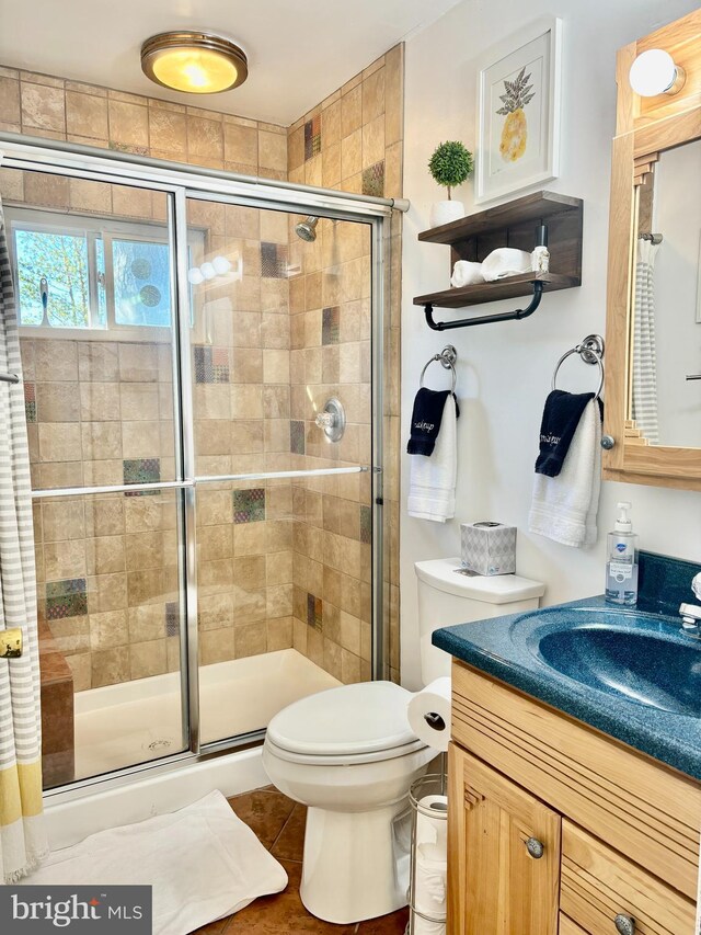 clothes washing area featuring stacked washer and clothes dryer