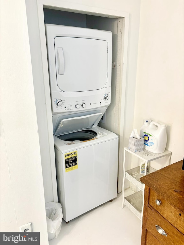 laundry area with laundry area and stacked washing maching and dryer