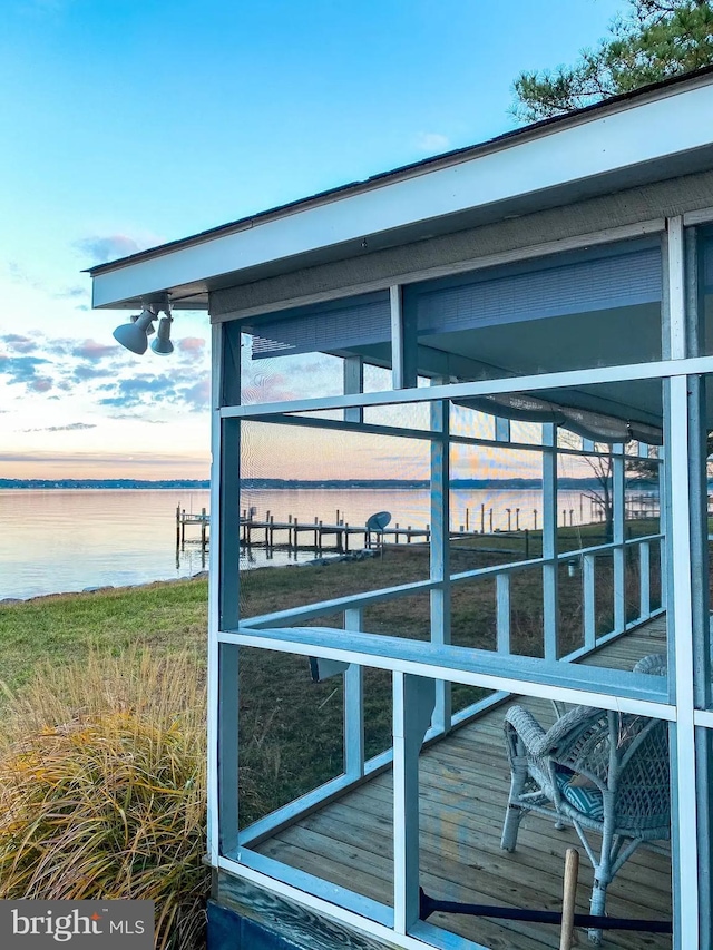 dock area with a water view