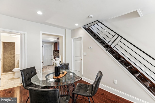 dining area featuring wood-type flooring