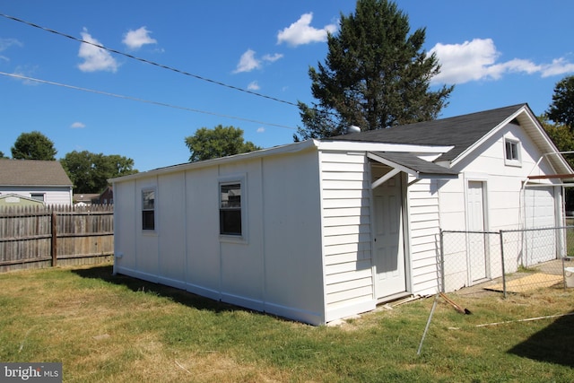 view of outdoor structure with an outdoor structure and fence