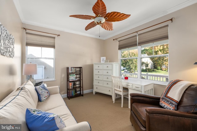 carpeted living room featuring crown molding and ceiling fan