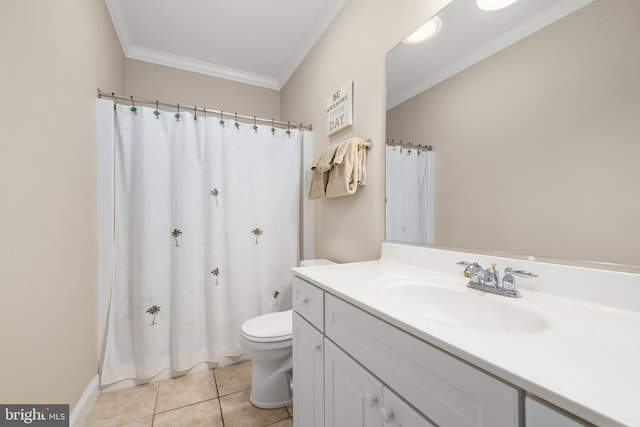 bathroom featuring vanity, crown molding, tile patterned floors, and toilet