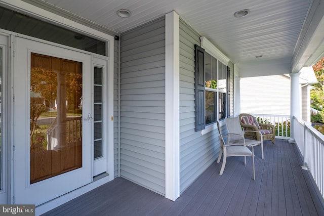 deck featuring covered porch