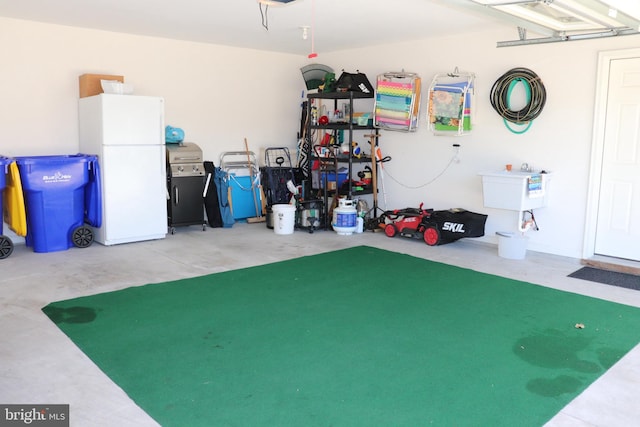 garage with white fridge