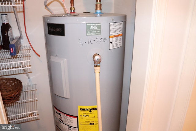 utility room with water heater