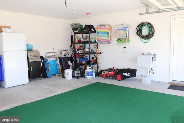 garage with white fridge