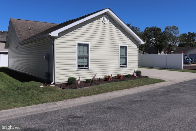 view of home's exterior featuring a lawn