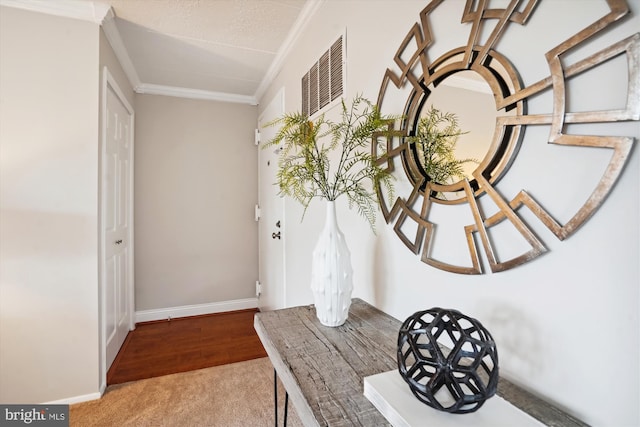 details featuring hardwood / wood-style floors and crown molding