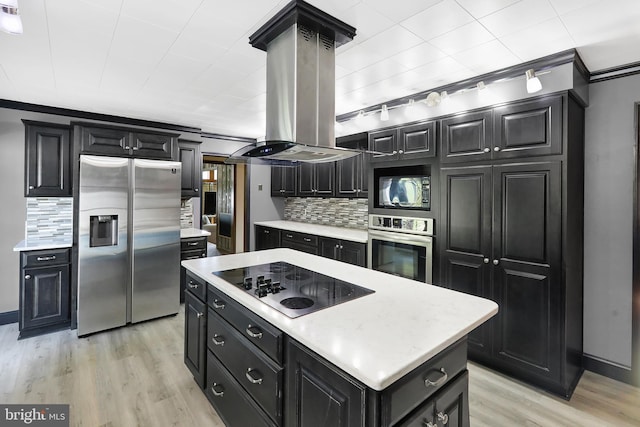 kitchen with light wood-type flooring, black appliances, island exhaust hood, a kitchen island, and ornamental molding