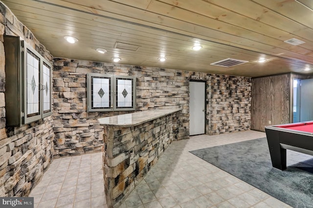 recreation room featuring bar, pool table, and wood ceiling