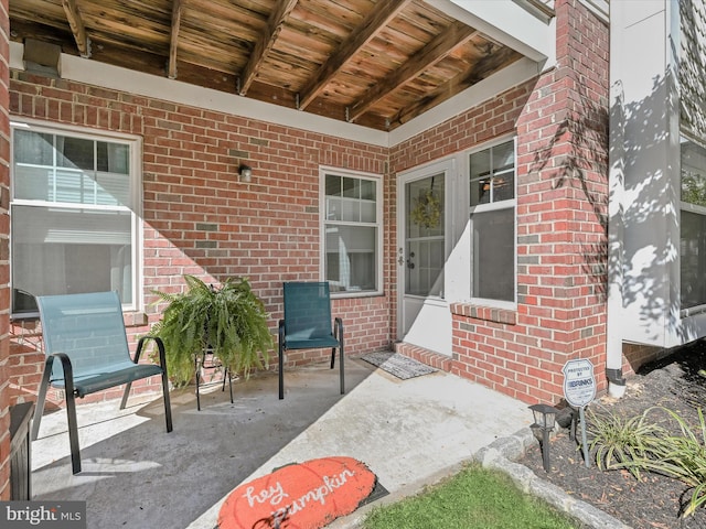 property entrance with a patio