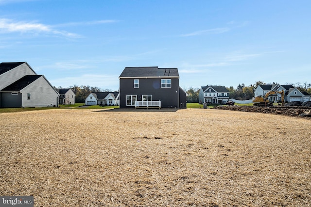 rear view of property featuring a residential view