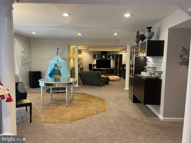 living room with recessed lighting, baseboards, light colored carpet, and ornate columns