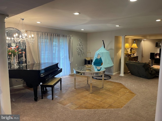 living area with carpet flooring, recessed lighting, and decorative columns