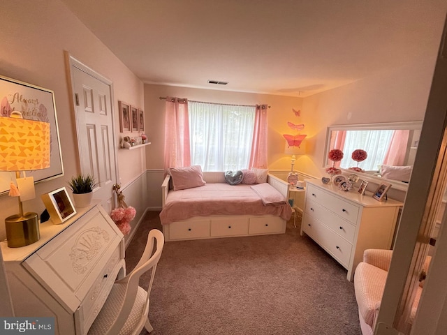 bedroom featuring visible vents and carpet flooring