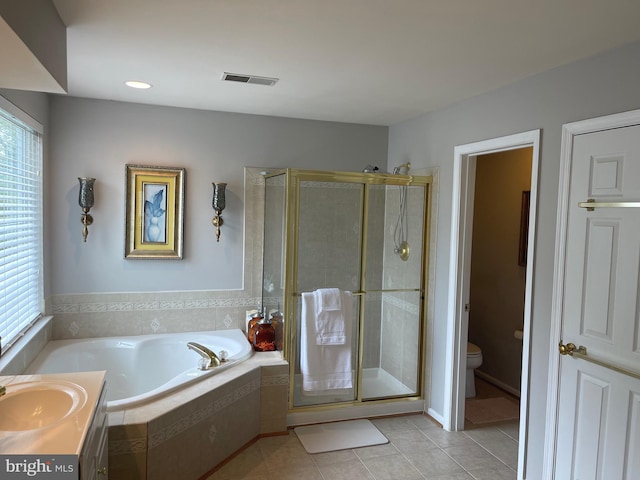 full bath with visible vents, a stall shower, a sink, tile patterned flooring, and a bath