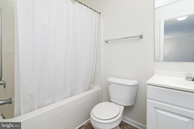 full bathroom featuring vanity, toilet, and shower / tub combo