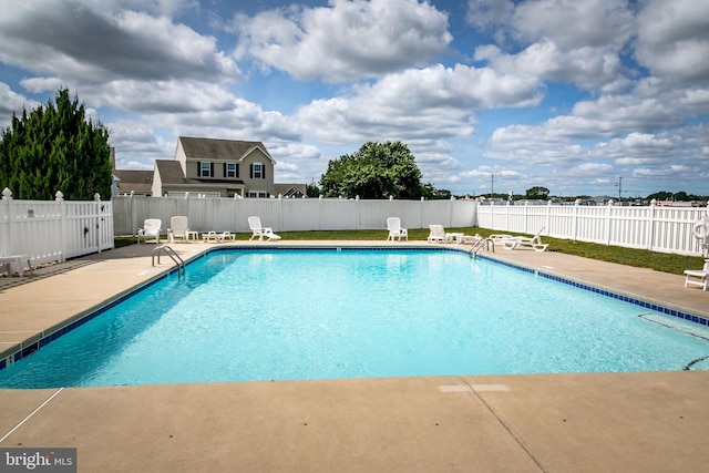 view of pool featuring a patio area