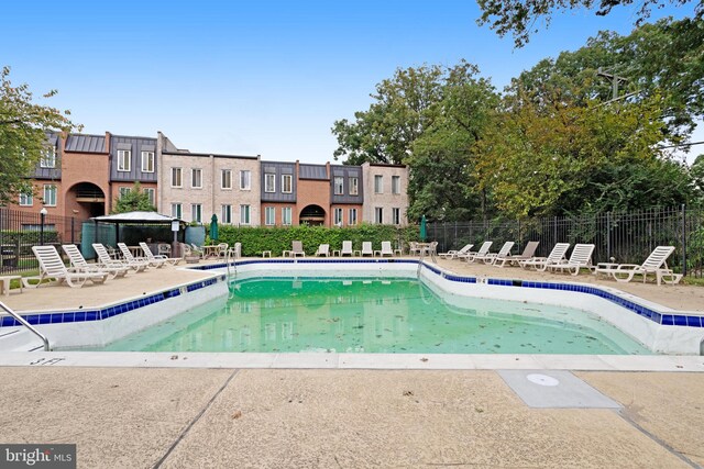 view of pool with a gazebo and a patio