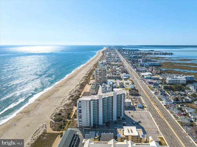 bird's eye view with a view of the beach and a water view