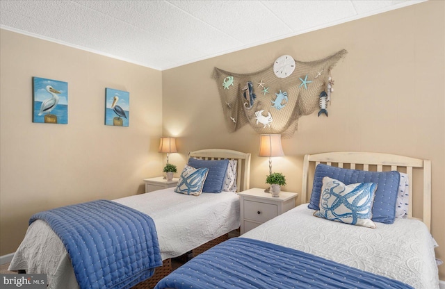 bedroom featuring ornamental molding