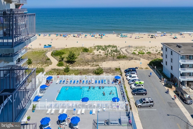 aerial view featuring a beach view and a water view