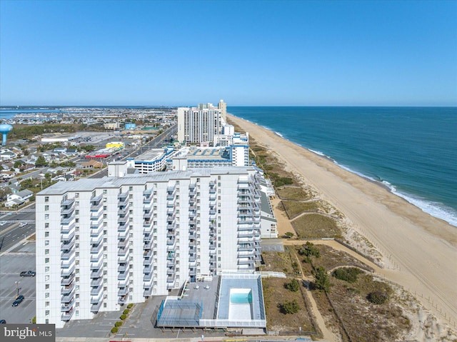 bird's eye view with a view of the beach and a water view