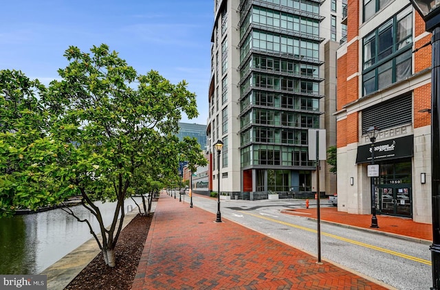 view of building exterior with a water view