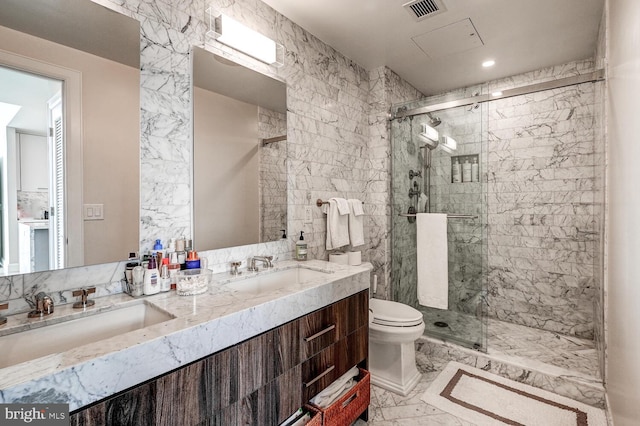 bathroom featuring walk in shower, vanity, and toilet