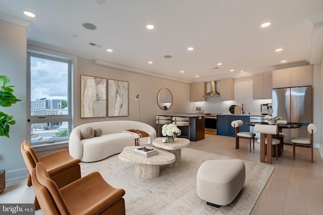 living room with light hardwood / wood-style floors