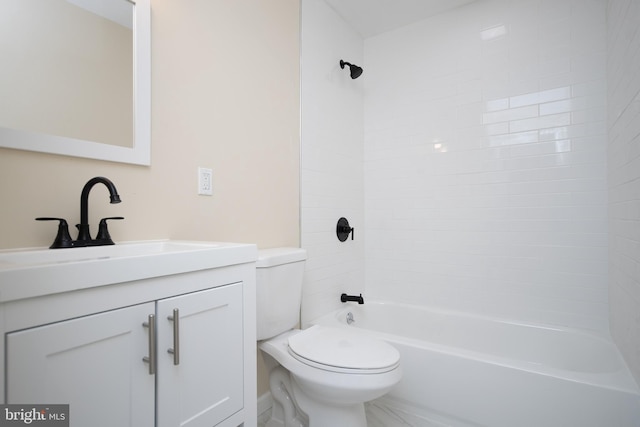 bathroom featuring tub / shower combination, toilet, and vanity