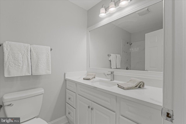 full bathroom featuring visible vents, toilet, vanity, and walk in shower