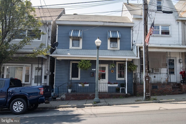 view of front of home featuring covered porch