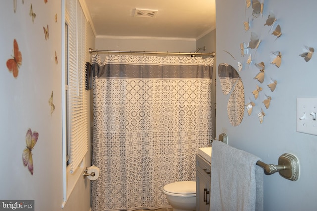 bathroom featuring crown molding, vanity, toilet, and a shower with curtain